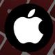 logotipo de apple sobre fondo difuminado de iPhone