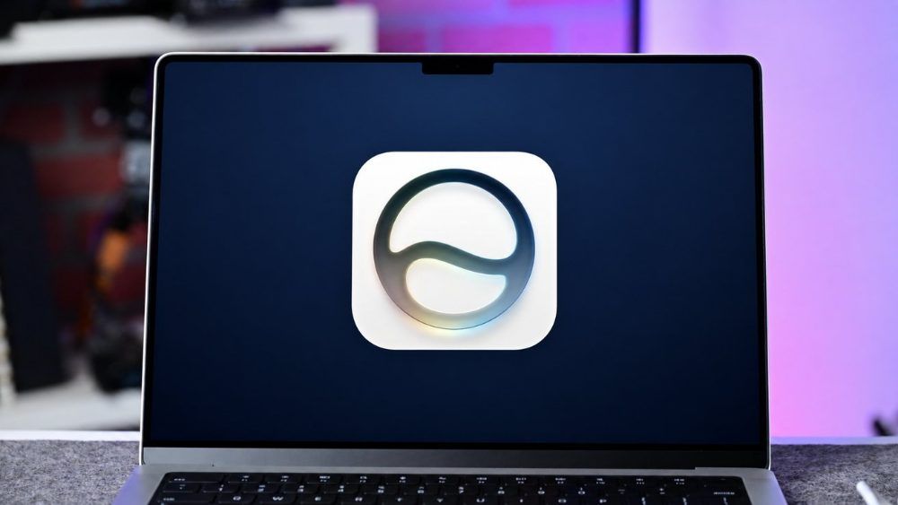 Icono de Apple Intelligence mostrado a pantalla completa en un ordenador portátil Mac.