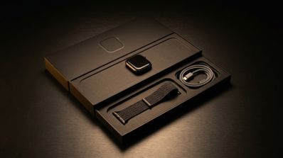 Caja del Apple Watch Series 12 con el reloj, la correa y el cable magnético a USB-C