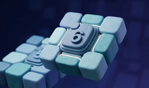 Ilustración tridimensional de un bloque tecnológico de color azul con el número 6 grabado en relieve en el centro, con otra estructura similar con el número 5 en un plano trasero desenfocado.