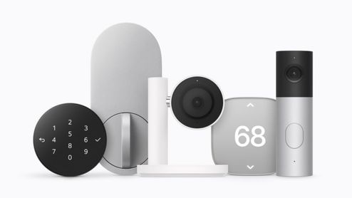 Conjunto de dispositivos Apple Home Collection que incluye cámara de seguridad, termostato digital, timbre inteligente y cerradura electrónica en tonos gris y blanco.