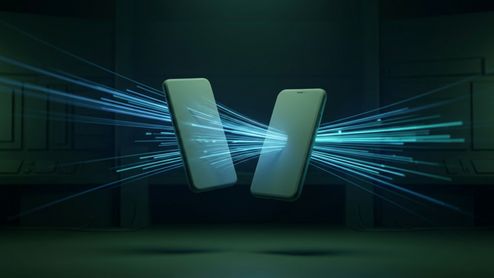 Ilustración conceptual de dos teléfonos móviles flotando, conectados por haces de luz azul que atraviesan sus pantallas en un entorno oscuro.